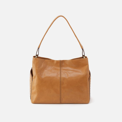 Seneca Shoulder Bag In Polished Leather - Natural | HOBO