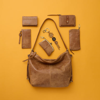Jill Trifold Wallet In Buffed Leather - Whiskey | HOBO